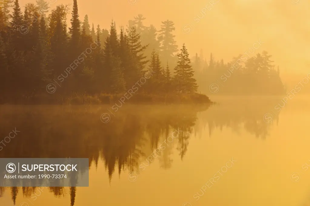 Early morning fog at Lyons Lake, Whiteshell Provincial Park, Manitoba, Canada