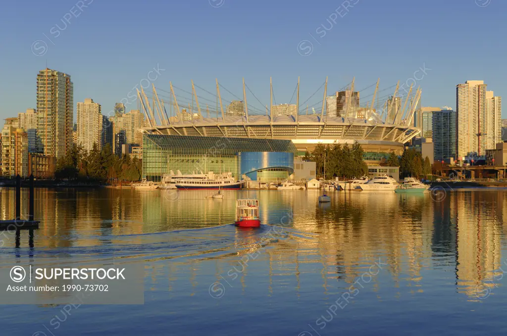 BC Place Stadium and Aquabus passenger ferry, False Creek, Vancouver, British Columbia, Canada