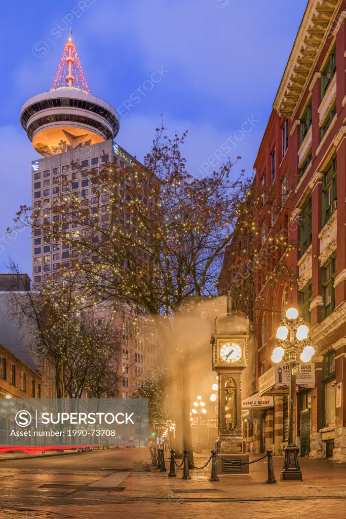 The Steam clock, Gastown, with Harbour Centre Tower in distance, Vancouver, British Columbia, Canada
