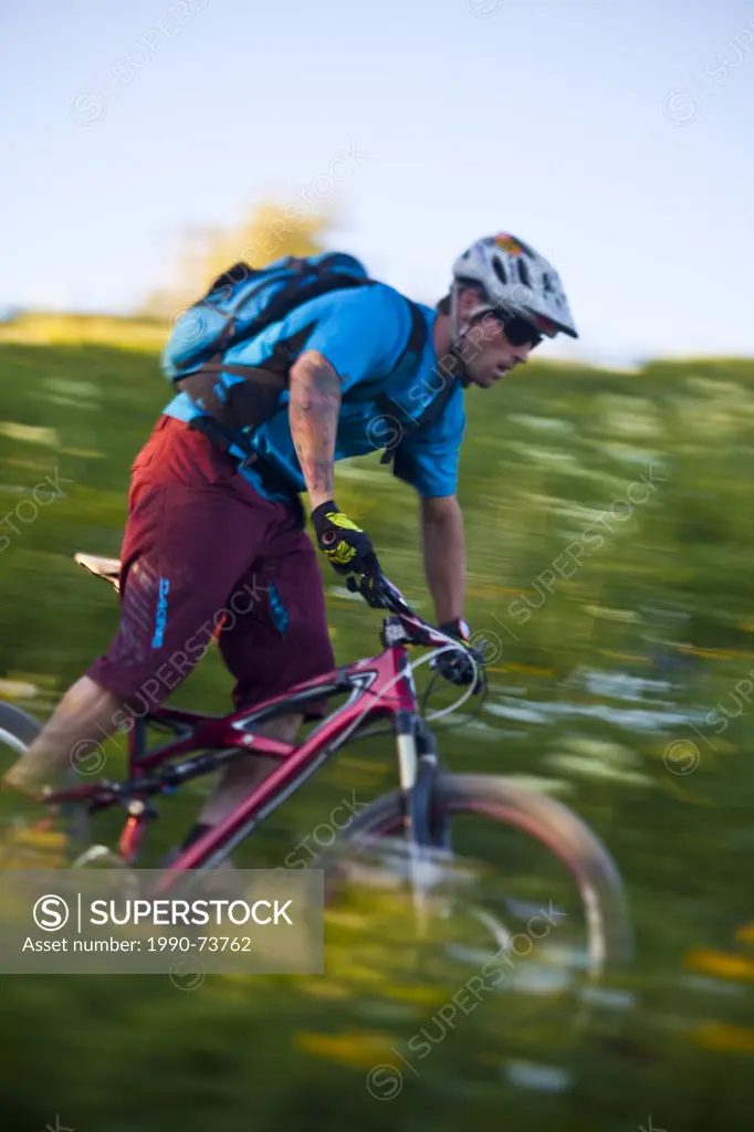 A male mountain biker rides the 401 Trail, Crested Butte, CO