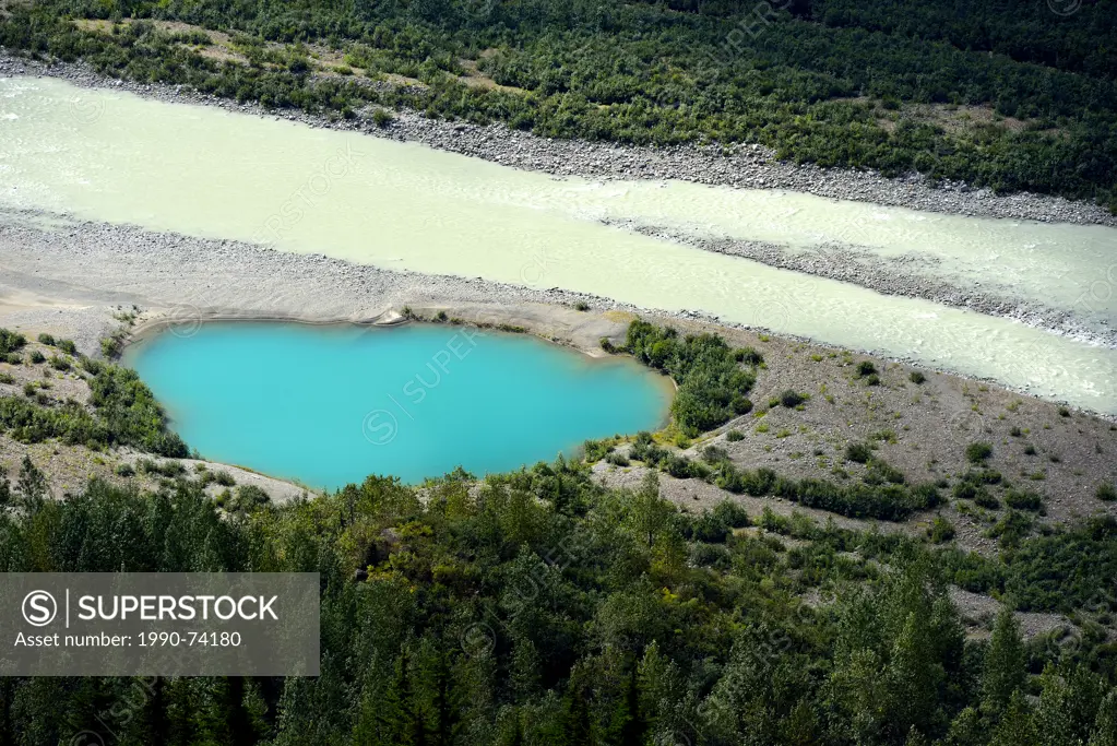 A small blue Kettle formed in the Salmon River valley in northern B.C. by the melting of glacier ice blocks that became stranded after the toe of the ...