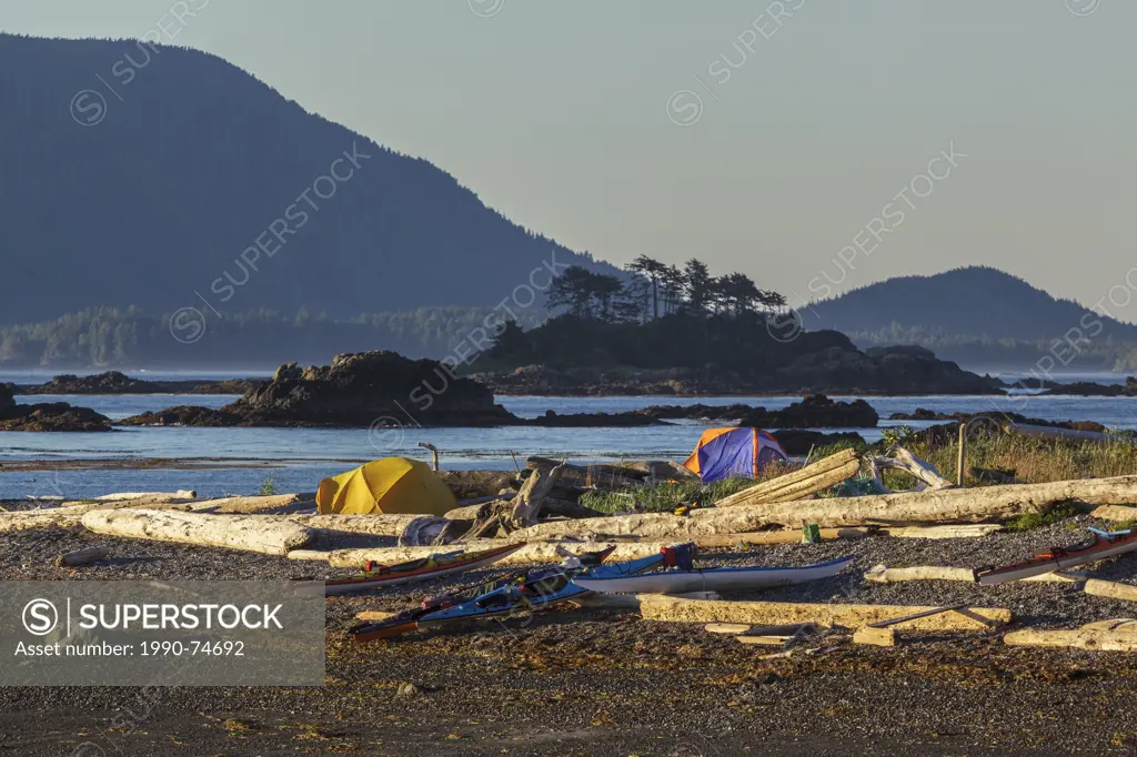 Kayakers set up camp on an island in Nuchatlitz Provincal Park, off the west coast of Vancouver Island British Columbia,Canada.