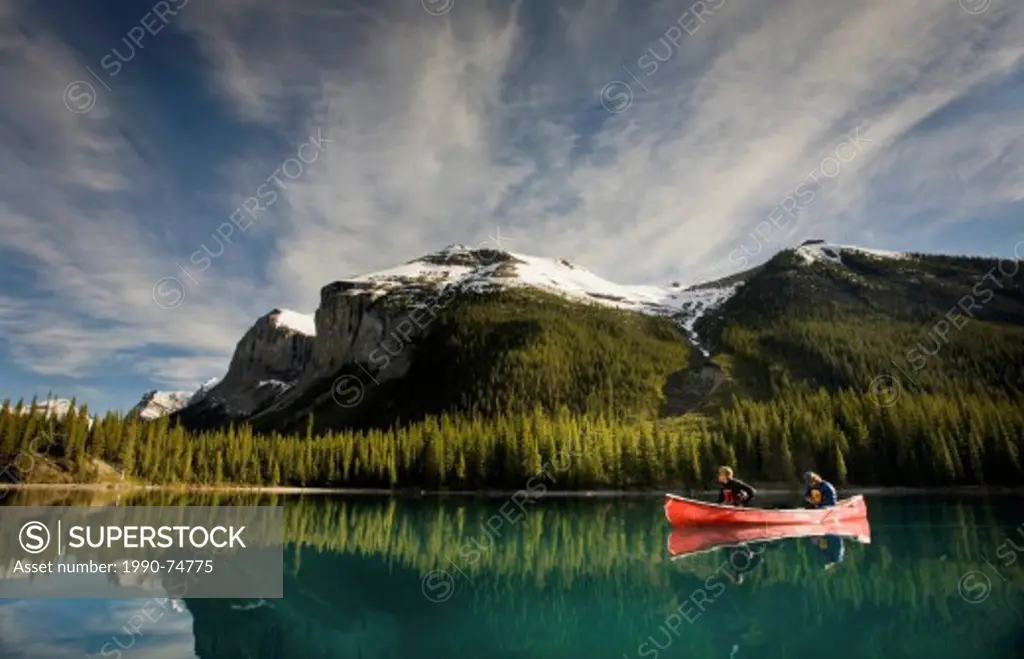 Couple in canoe, Maligne Lake, Jasper National Park, Alberta, Canada.