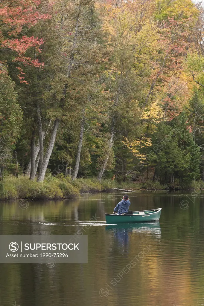 A lone paddler in autumn near Labelle, Quebec. © Allen McEachern.