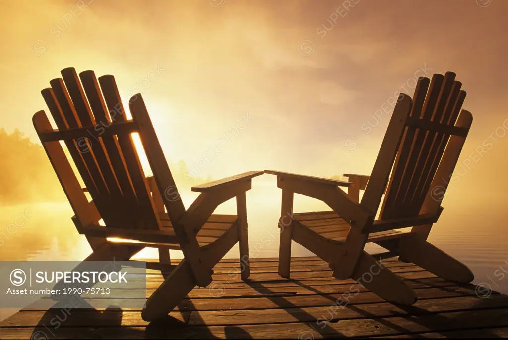 Adirondack chairs on dock, Lyons Lake, Whiteshell Provincial Park, Manitoba, Canada