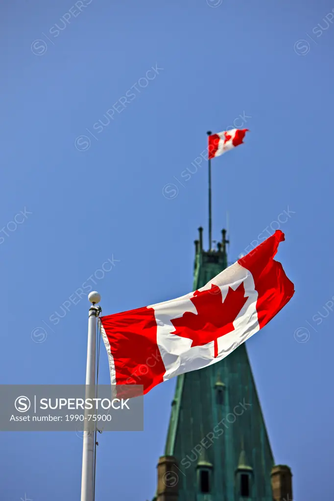 Peace Tower in the Centre Block of the Parliament Buildings and a Canadian National Flag, Parliament Hill, City of Ottawa, Ontario, Canada