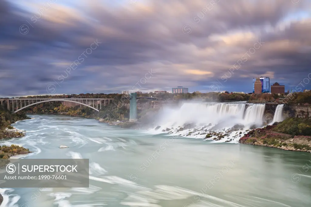 American Falls and Rainbow Bridge crossing the Niagara River, Niagara Falls, New York, USA