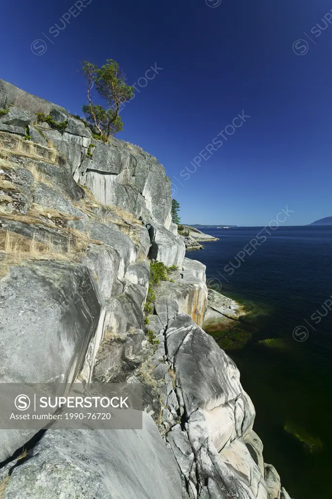 Stillwater Bluffs a local climbing area boasts clean granite cliffs that rise out of the sea just south of Powell River. Powell River, The Sunshine Co...