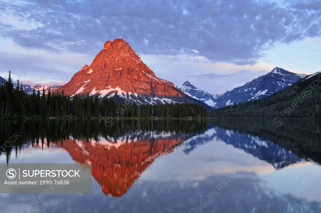 Sinapah Mountain reflected in Two Medicine Lake at dawn, Glacier National Park (Two Medicine sector), Montana, USA, Glacier National Park (Two Medicin...