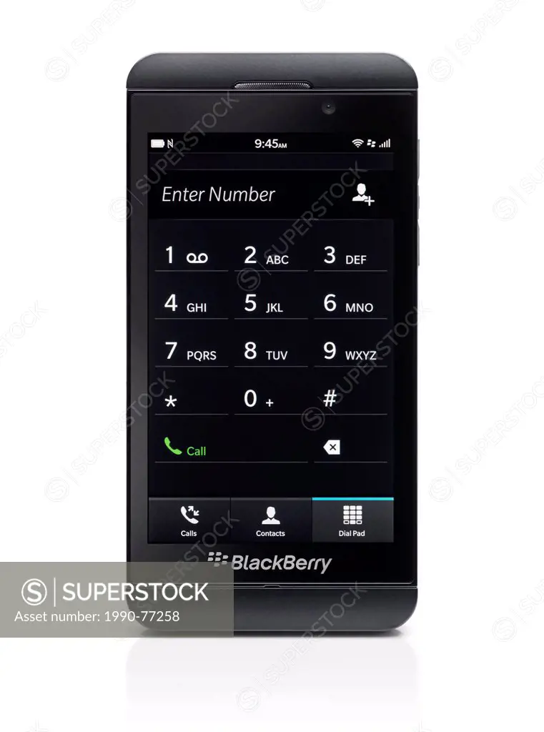 Blackberry Z10 smartphone with phone dial pad on its display. Black phone isolated on white background with clipping path