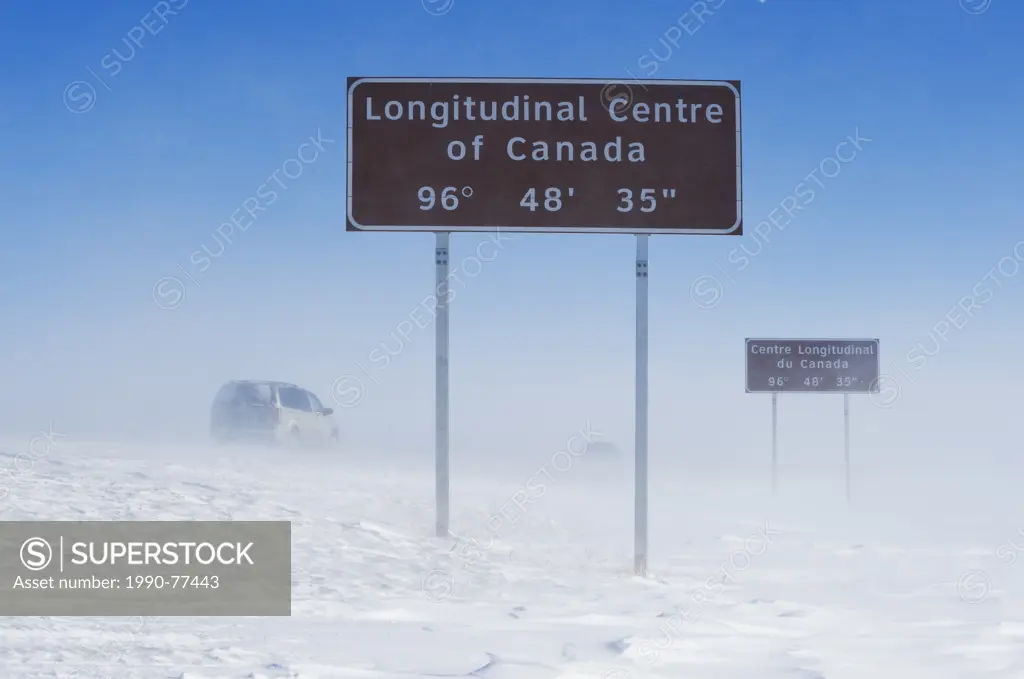 signage along Trans-Canada Highway east of Winnipeg during winter, Manitoba, Canada