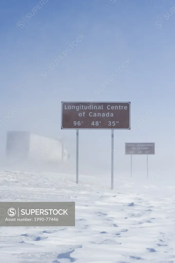 signage along Trans-Canada Highway east of Winnipeg during the winter, Manitoba, Canada