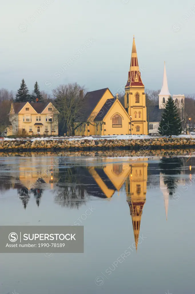Anglican Church reflected in waterfront, Mahone Bay, Nova Scotia, Canada