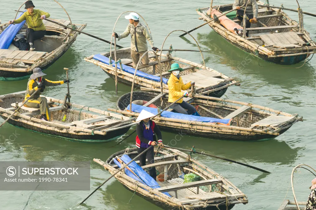 A floatilla of taxi boats await passengers in Cat Ba, Vietnam