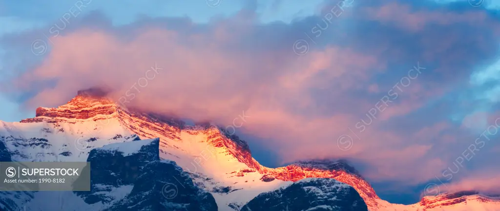 Three Sisters Mountain range at dawn, Canmore, Alberta, Canada
