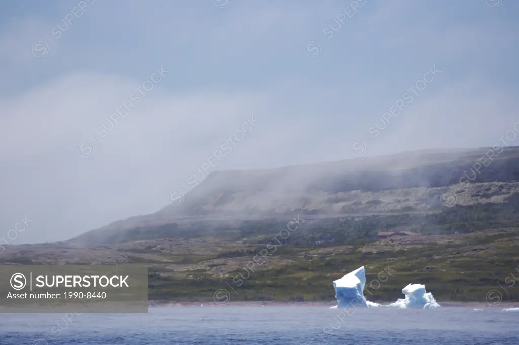 Icebergs near the shores at the mouth of the Pinware River in the Pinware River Provincial Park, Pinware, on a foggy morning, along the Labrador Coast...