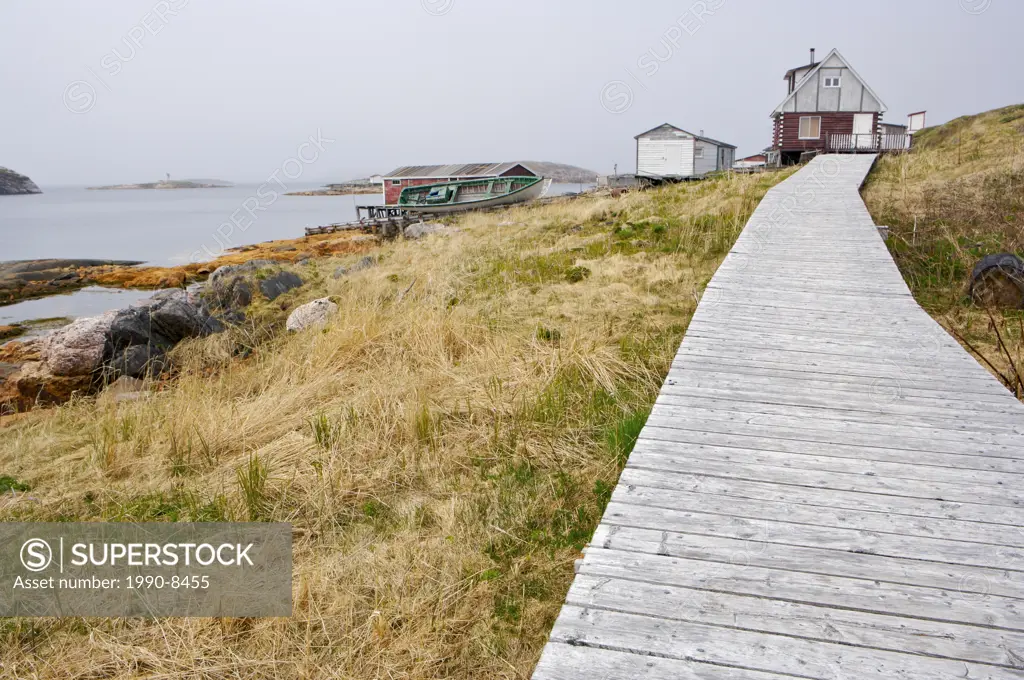 Boardwalk along the waterfront at the historic fishing village of Battle Harbour situated on Battle Island at the entrance to the St Lewis Inlet, Viki...