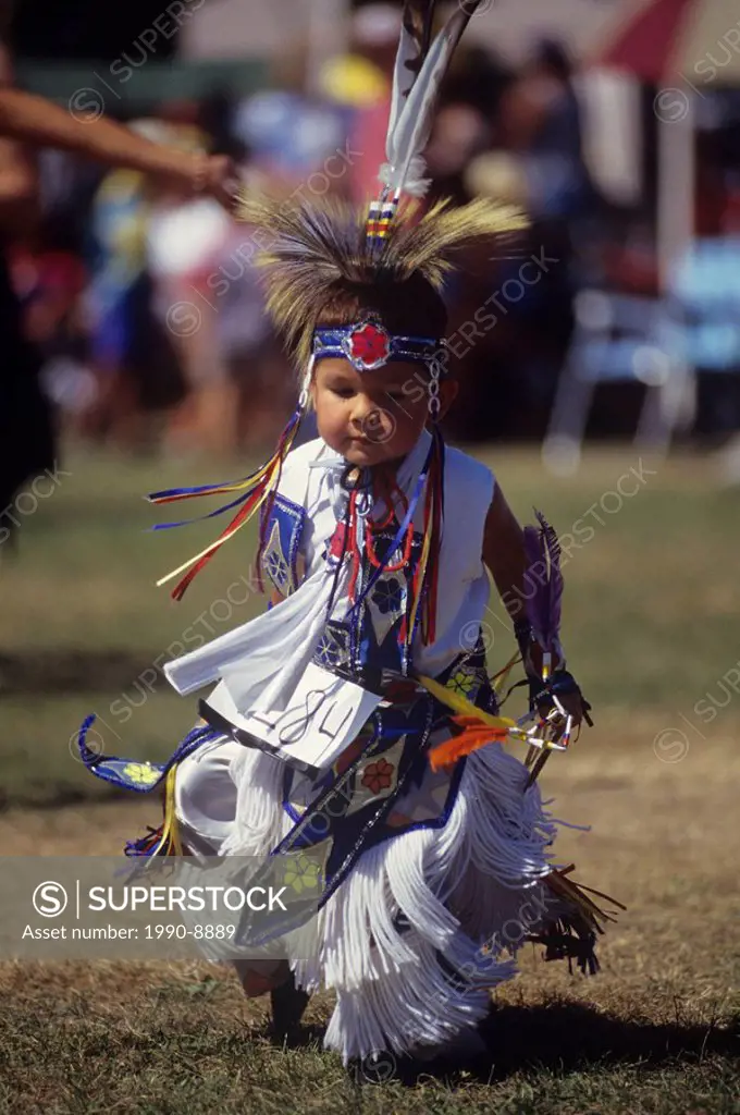 Young boy at Vancouver Island Thunder Pow Wow Drum and Dance competitio, Duncan, British Columbia, Canada