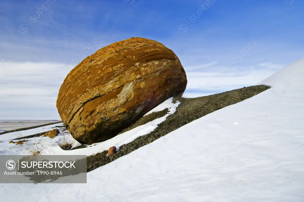 Marinen concretion in winter, Red Rock Coulee Natural Preserve, Alberta, Canada.