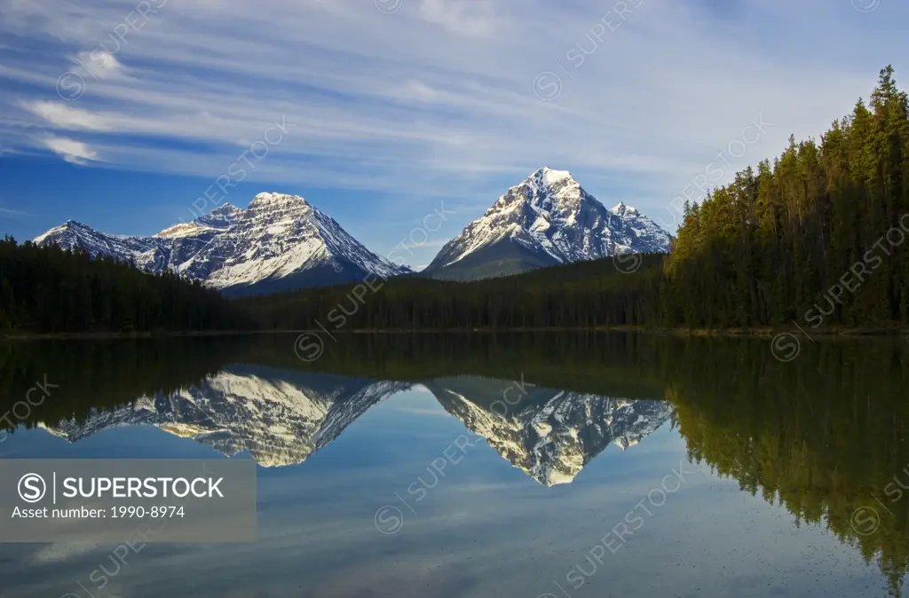 Canadian Rocky Mountains reflected in Leech Lake, Whirlpool Peak at left and Mt Fryatt on right, Jasper National Park, Alberta, Canada.