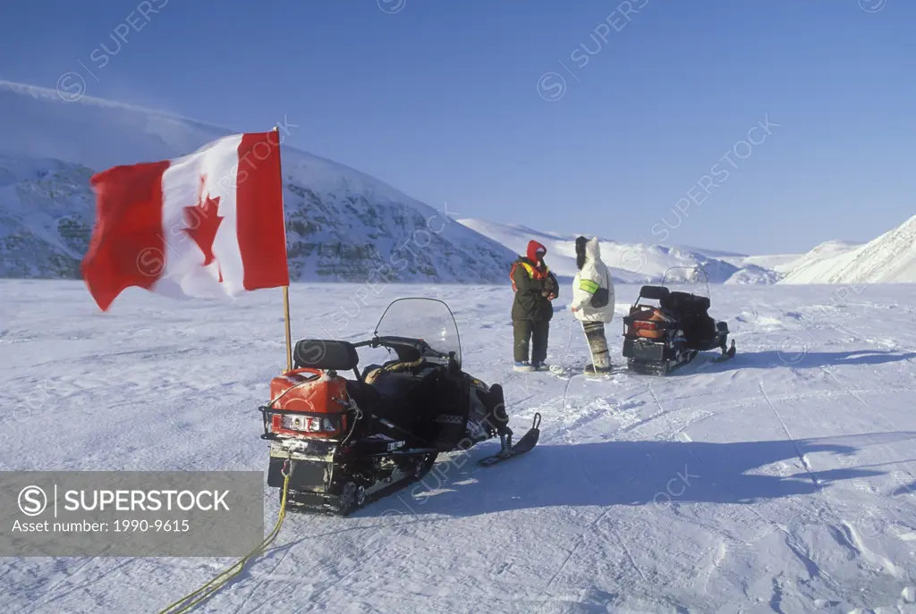 Snowmobiling near Sovereignty, Nunavut, Canada.
