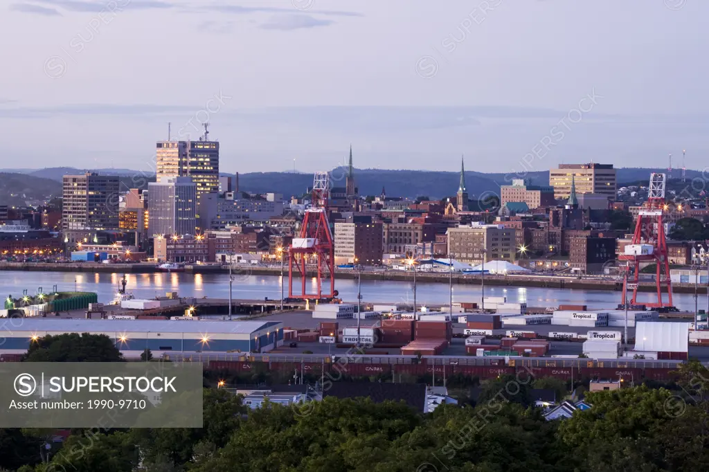 Container port with Saint John Harbour and city skyline in background, New Brunswick, Canada.