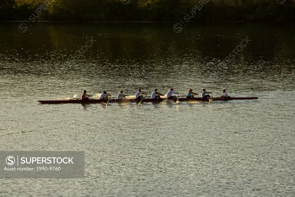 Rowing crew trains at Royal Canadian Henley Regatta Course, on Twelve Mile Creek, St. Catherines, Ontario, Canada.