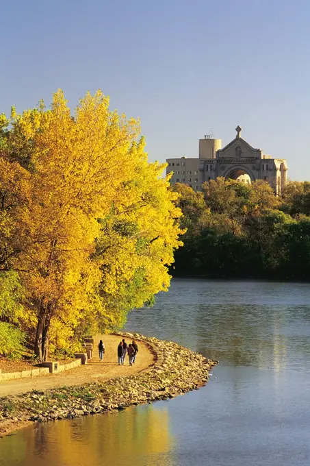 walkway along the Red River with St. Boniface in the background, Winnipeg, Manitoba, Canada autumn