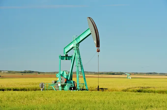 Oil pump jack and oats Carlyle Saskatchewan Canada