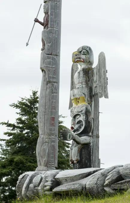 Thunderbird and Dzunukwa by Willie Seaweed, with other poles, Namgis Burial grounds, Alert Bay, Cormorant Island, Vancouver Island, British Columbia, ...