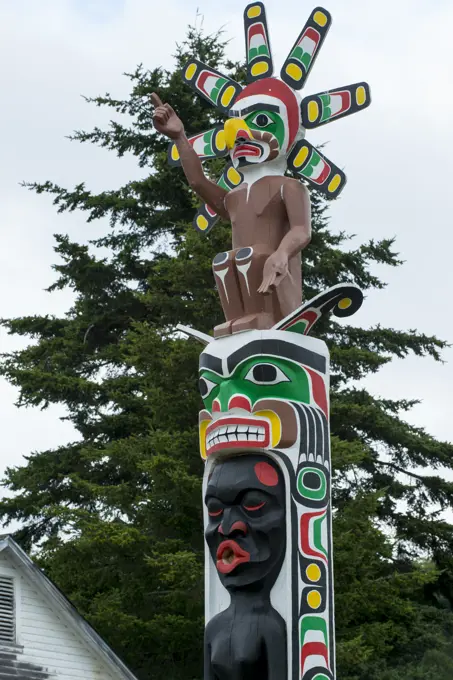 Totem pole by Beau Dick and others at Namgis Burial grounds, Alert Bay, Cormorant Island, Vancouver Island, British Columbia, Canada