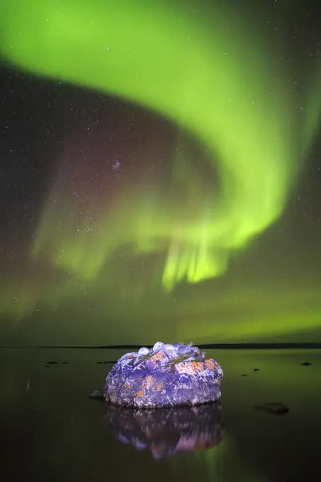 Aurora Borealis over Ennadia Lake, Nunavut, Canada in the Canadian arctic