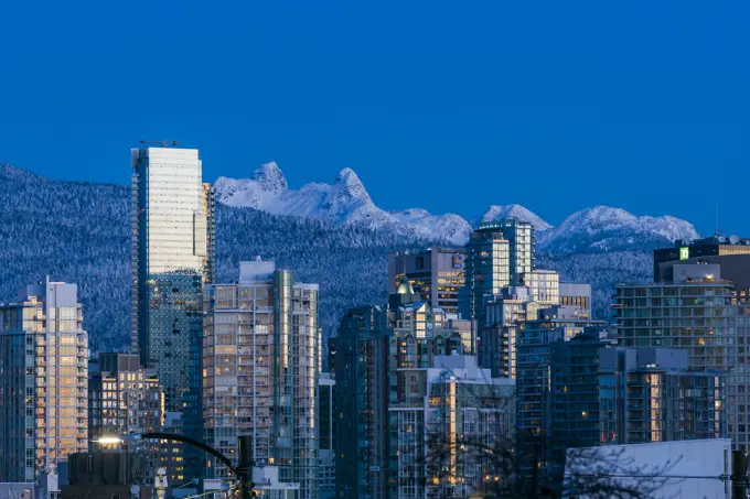 Vancouver downtown city skyline and North Shore mountains, Vancouver, British Columbia, Canada.
