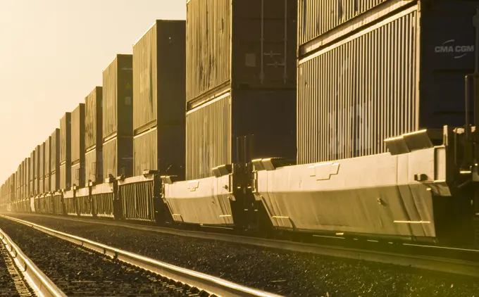 shipping containers on rail cars , near Winnipeg, Manitoba, Canada