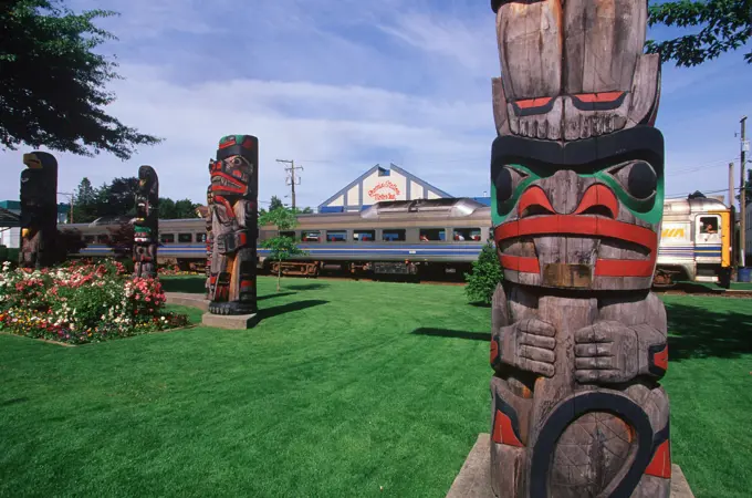 Duncan train station - E&N Dayliner and totems, Vancouver Island, British Columbia, Canada
