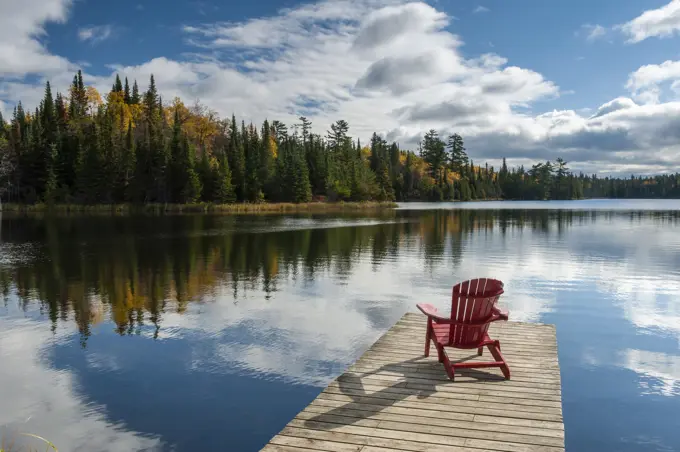 chair on dock, Lyons Lake,  Whiteshell Provincial Park, Manitoba, Canada