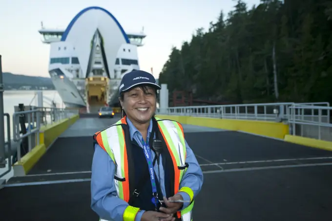 A First Nations BC Ferry employee aboard the MV Northern Explorer in Port Hardy, Vancouver Island, British Columbia, Canada