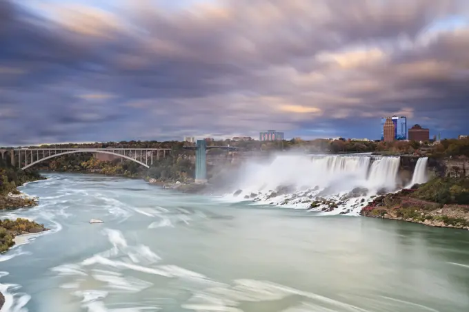 American Falls and Rainbow Bridge crossing the Niagara River, Niagara Falls, New York, USA