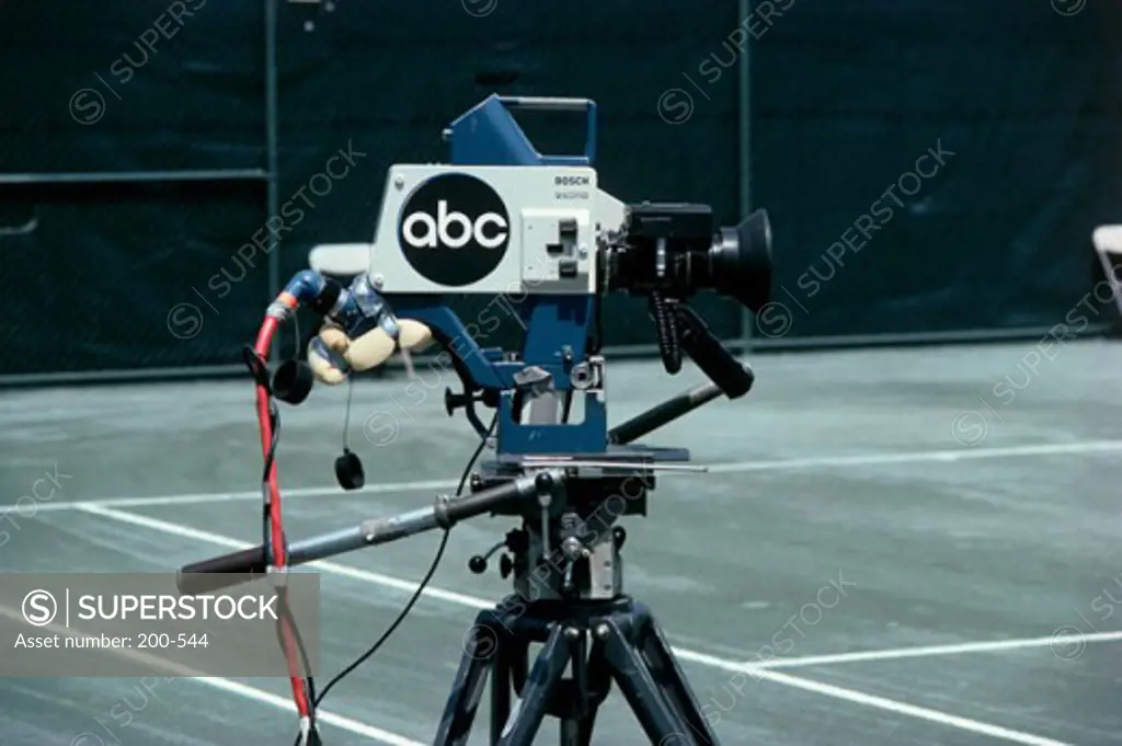 Close-up of a television camera on a tennis court