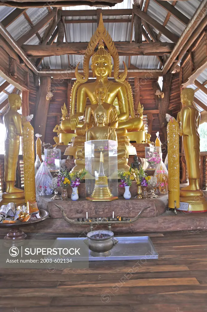 Golden Buddha statue in a temple, Wat Srivichai, Nong Bua Lamphu, Thailand