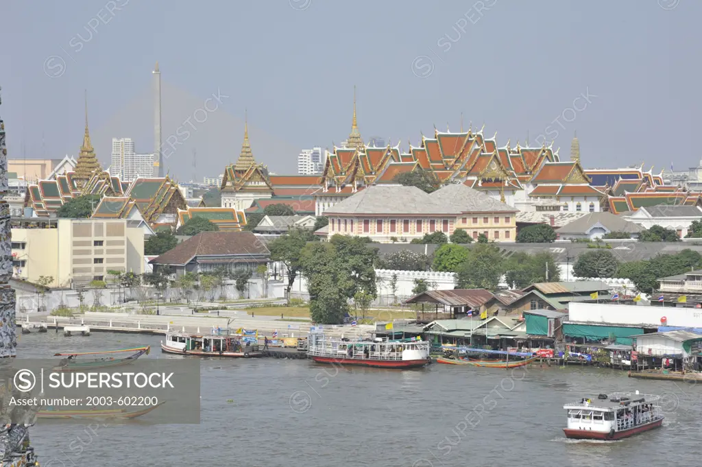 Buildings at the waterfront, Chao Phraya River, Grand Palace, Bangkok, Thailand