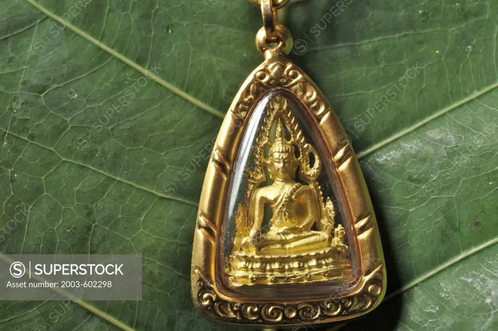 Buddhist amulet on a leaf, Bangkok, Thailand
