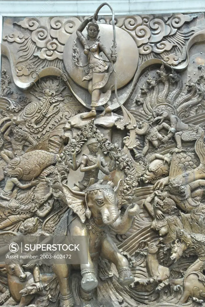 Thailand, Bangkok, Wat Traimit in Chinatown, Close up of bas relief