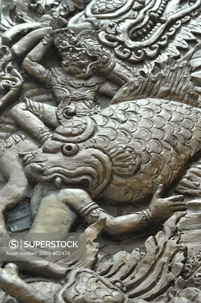 Thailand, Bangkok, Wat Traimit in Chinatown, Close up of bas relief