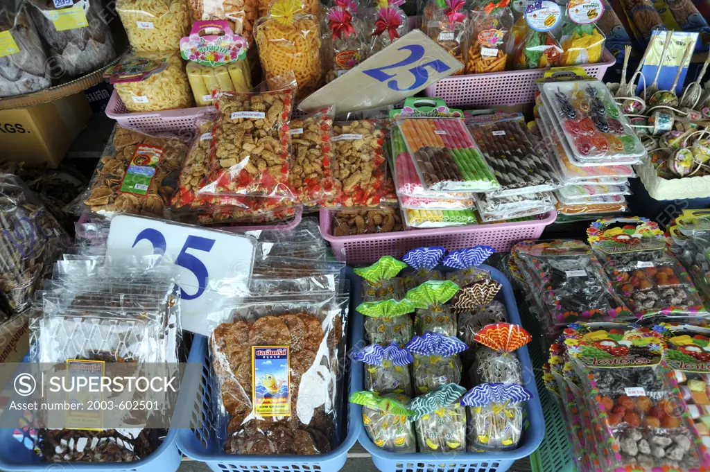 Thailand, Chon Buri, Ban Saen, Nongmun Market, Close up of seafood snacks and sweets with seafood shapes