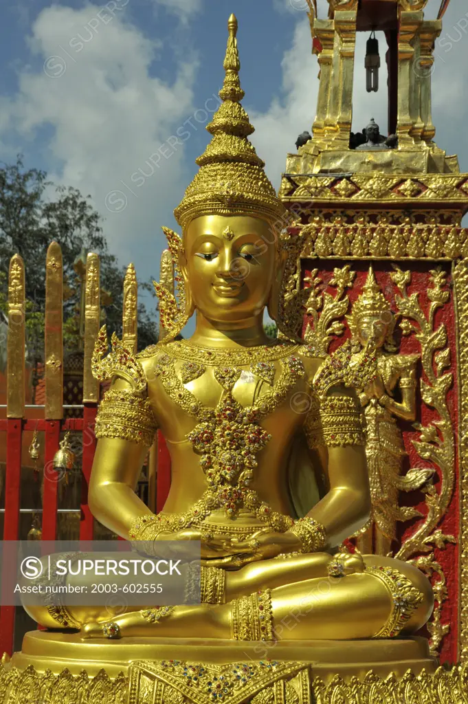 Detail of a golden statue of Buddha at Wat Phrathat Doi Suthep, Chiang Mai, Thailand