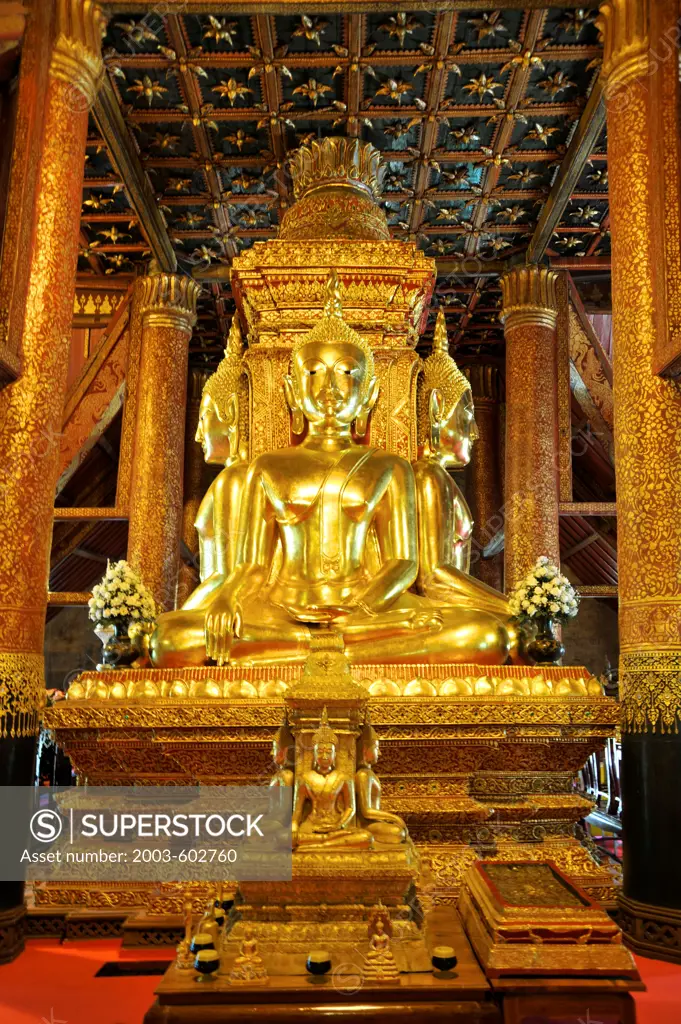 Thailand, Nan, 4 Golden Buddha statues at shrine inside Wat Phumin, Buddhist monastery founded in 1596