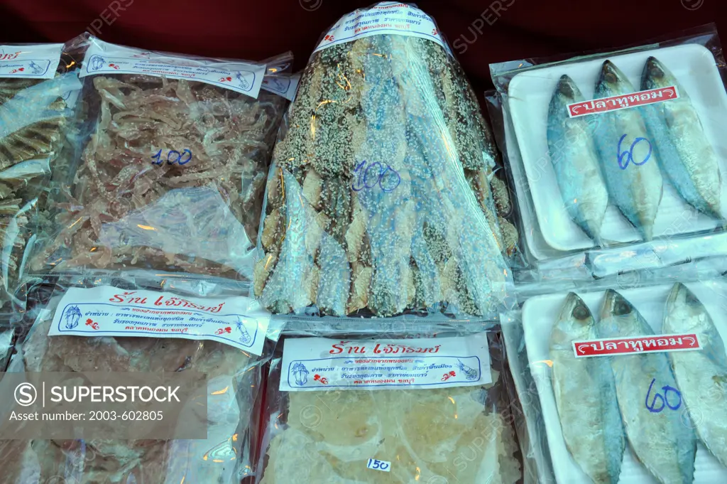Thailand, Khon kaen, Thai Dried Fish snacks, some with sesame seeds, Prices on packs are in Thai Baht