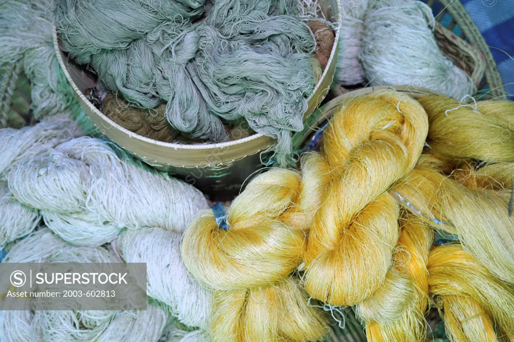 Thailand, Khon kaen, Thai silk threads just wound off the boiled cocoons