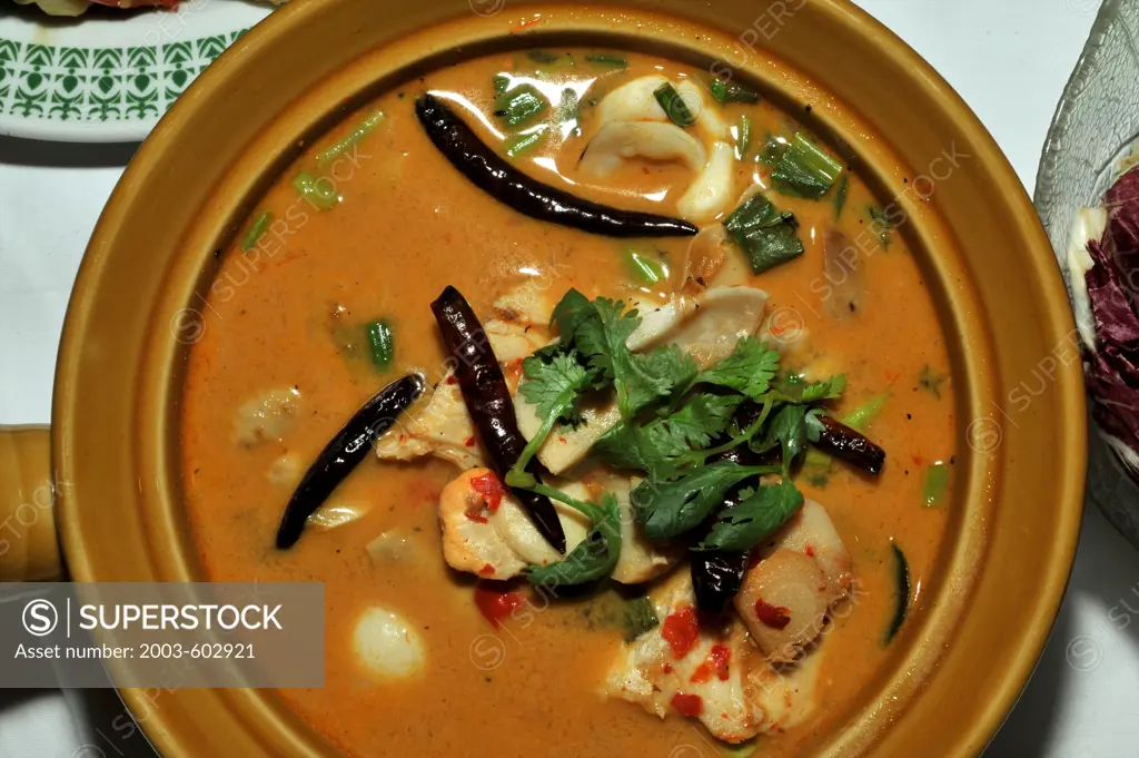 Tom Yum soup in a bowl